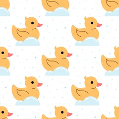 Seamless pattern with yellow ducks. Rubber ducks and soap bubbles on a white background. Cute flat illustration.