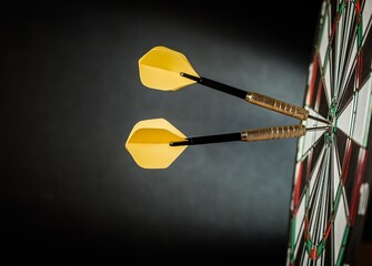 Closeup of Darts in Bullseye