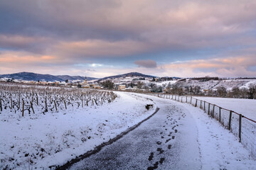 Fototapeta na wymiar Village of Denice and landscape of Beaujolais under the snow