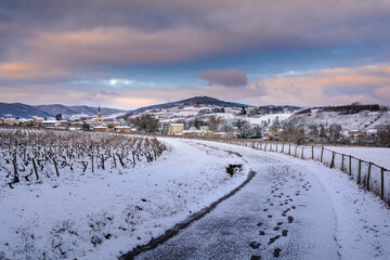 Village of Denice and landscape of Beaujolais under the snow