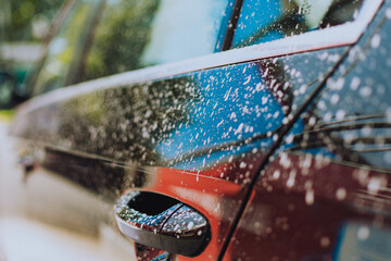 Foam car handle in the car wash