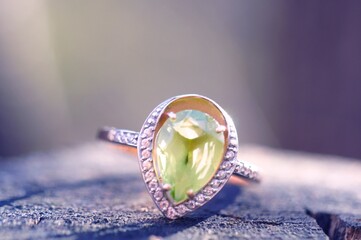 Wedding ring with chrysolite close-up.