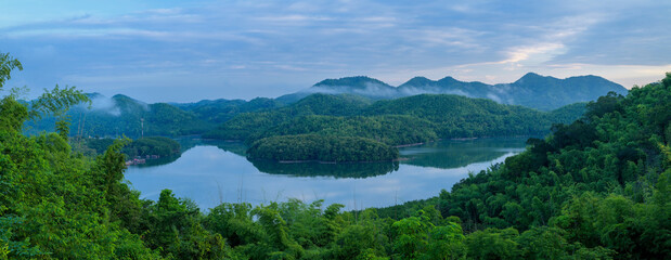Naklejka na ściany i meble Panoramic top view of lake and forest in nation park, Thailand.