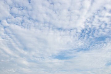 Clear blue color sky with white cloud background