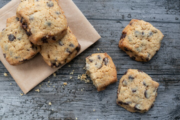 Cookies with dark chocolate chips on rustic background