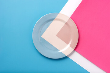 Plate with white line and with blue and pink colors
