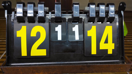 Photo of the scoreboard for the badminton court at the indoor court in Cikancung, Indonesia