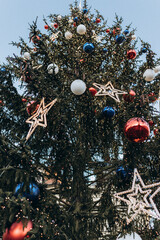 Decorated Christmas tree close-up.vertical Christmas background.