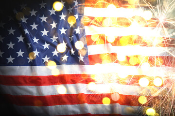 Independence Day of USA. National American flag and fireworks, bokeh effect