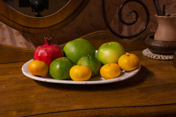 Fresh fruits on stone plate.Sweet natural big rustic red ripe strawberries