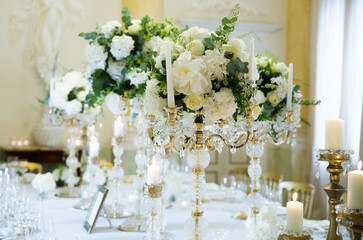 Wonderful flowers on a ceremony table in a villa