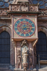Fototapeta na wymiar Astronomic clock on the outside of the Notre Dame Cathedral, Strasbourg, Alsace, France