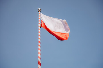 Powiewająca flaga Polski - obrazy, fototapety, plakaty