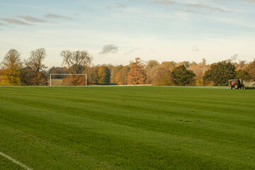 Fototapeta na wymiar Football pitch in autumn light