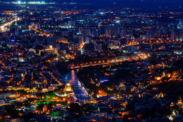 September 02, 2021 - Tbilisi, Georgia: Beautiful panoramic night view of the capital of Georgia Tbilisi, bird's eye view