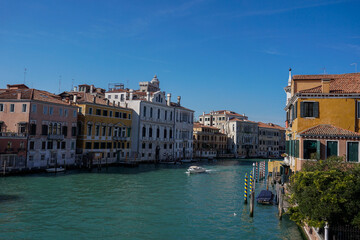 view of the Canale Grande in central Venice with many boats travelling about