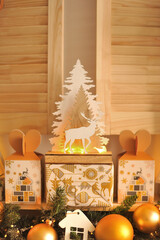 Christmas gifts and wooden deer figurine