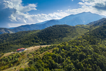Obraz premium Greece mountains, close to Mount Olympus. Stavros Refuge Shelter on the road