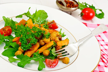 Salad with Chickpeas in a Curry Sauce, Arugula, Grilled Pumpkin