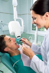 Close-up of a Dentist Working on Patient
