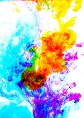 Color drop in water, photographed in motion. Ink swirling in water. Cloud of ink in water . Colorful ink in water, ink drop.