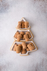 Wine corks in form the Christmas tree, eco-friendly new year, eco-style party concept.