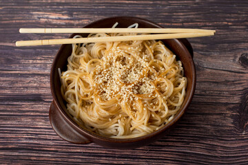 asian rice noodles on wooden dark table