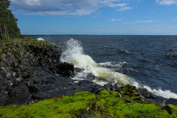 waves crashing on rocks