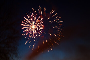 Sparks. Fireworks are class of explosive pyrotechnic devices used for aesthetic and entertainment purposes. Beautiful colorful fireworks sparkle in the night sky