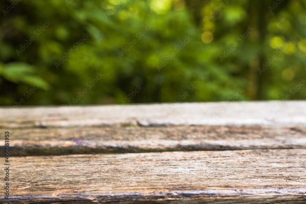 Canvas Prints Empty dark wooden table in front of abstract blurred bokeh background