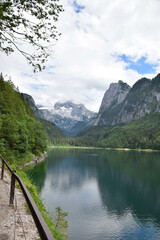 View of the Austria nature - high alpine and lakes in valley. Summer nature with green colors.