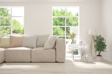 White living room with sofa and summer landscape in window. Scandinavian interior design. 3D illustration