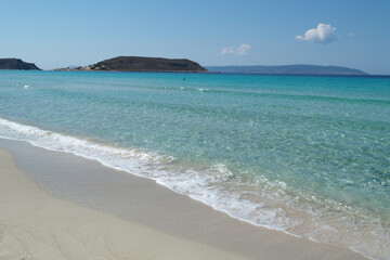Beautiful sandy beach of Simos with crystal clear turquoise sea and natural sand dunes, Elafonisos island, Peloponnese, Greece