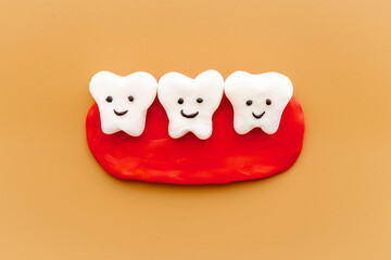 Teeth models with caries or plaque on gums. Oral health concept