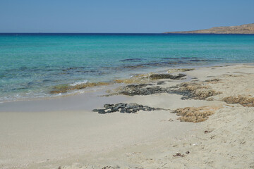 Beautiful sandy beach of Simos with crystal clear turquoise sea and natural sand dunes, Elafonisos island, Peloponnese, Greece