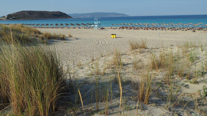 Beautiful sandy beach of Simos with crystal clear turquoise sea and natural sand dunes, Elafonisos island, Peloponnese, Greece