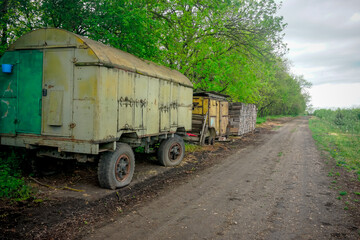 Old container on wheels on a rural road