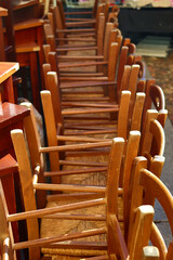 pile of wooden chairs