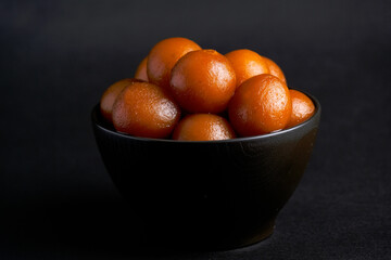 Indian Traditional Special Sweet Food Gulab Jamun, Indian Dessert or Sweet Dish, popular festival or wedding food.