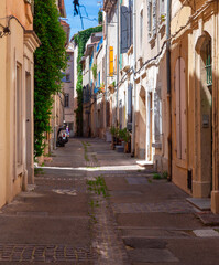 Arles. Old narrow street in the historic center of the city.
