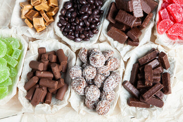 Assortment of delicious chocolate candies background. Chocolate candy isolated 