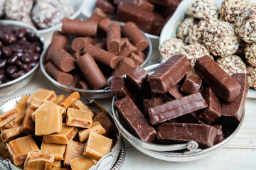 Assortment of delicious chocolate candies background. Chocolate candy isolated 