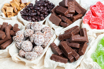 Assortment of delicious chocolate candies background. Chocolate candy isolated 