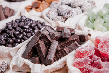 Assortment of delicious chocolate candies background. Chocolate candy isolated 