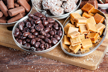 Assortment of delicious chocolate candies background. Chocolate candy isolated