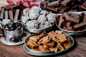 Assortment of delicious chocolate candies background. Chocolate candy isolated