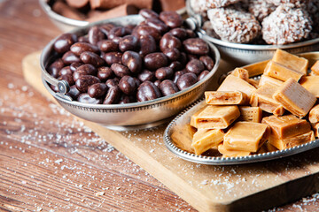 Assortment of delicious chocolate candies background. Chocolate candy isolated