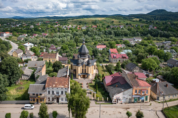 Fototapeta na wymiar Aerial view on Church of St. Andrew the First-Called in Dobromyl, Ukraine from drone