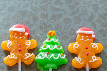 Christmas Lollipops on a Green Background