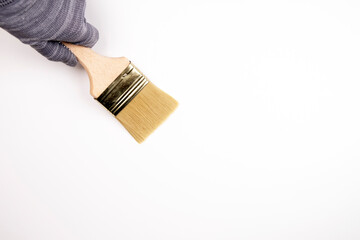 Brush in hand. Building and renovating home